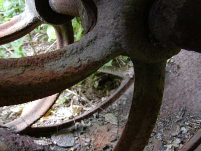 an old tennis court roller