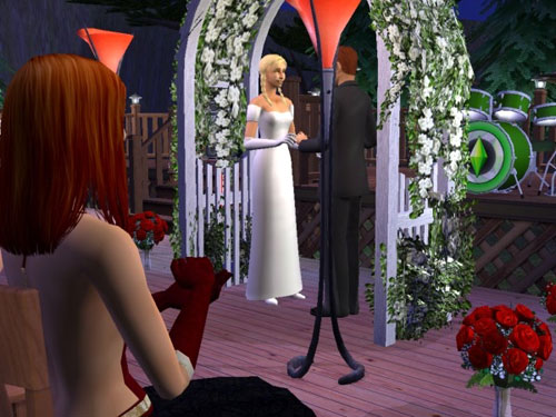Sally looks on as the father of her children gets married.