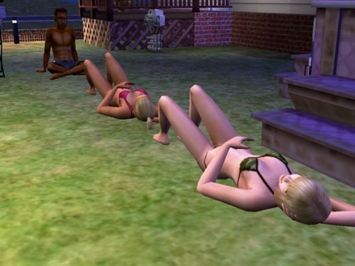 Damion and two recumbent scantily-clad young women Damion and two recumbent scantily-clad young women