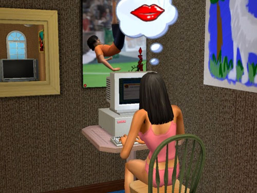 Danielle at the computer, thinking about lips