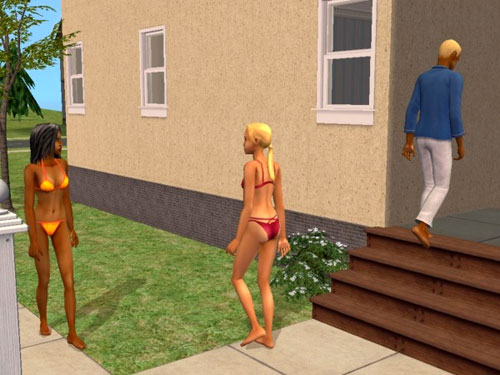 Gabriel and some attractive young women in swim suits, outside the dorm