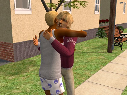 George and Gabriel hug on the sidewalk
