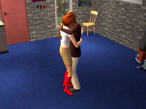 Gina and Dawson smooching in the living room