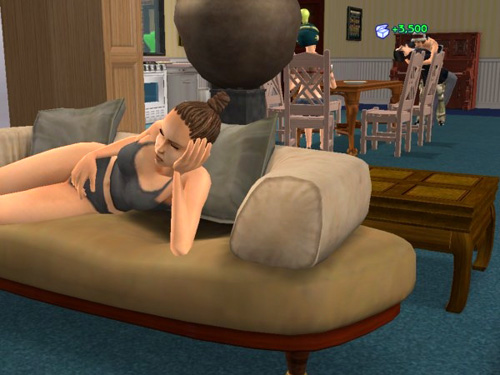 Brandi lounges on the couch while Joan and Peran make out in the background